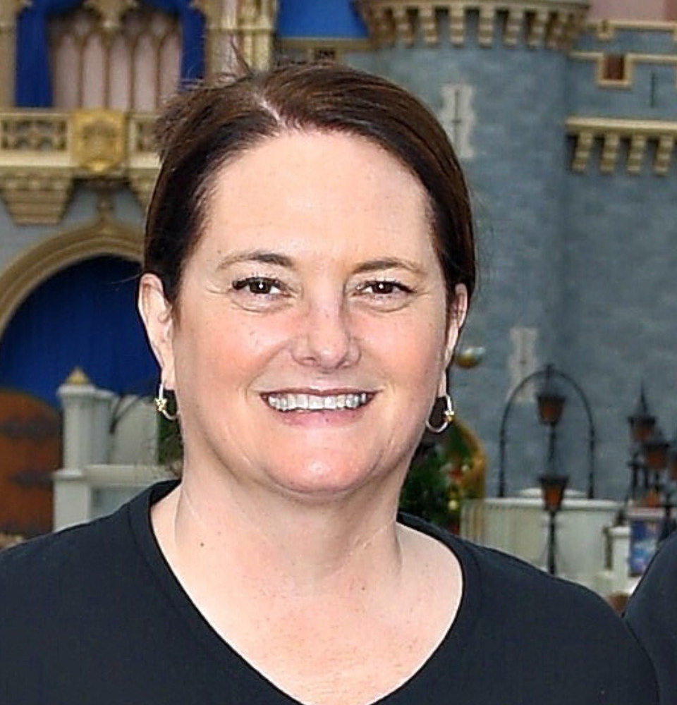 Mrs Opilka smiling for the camera