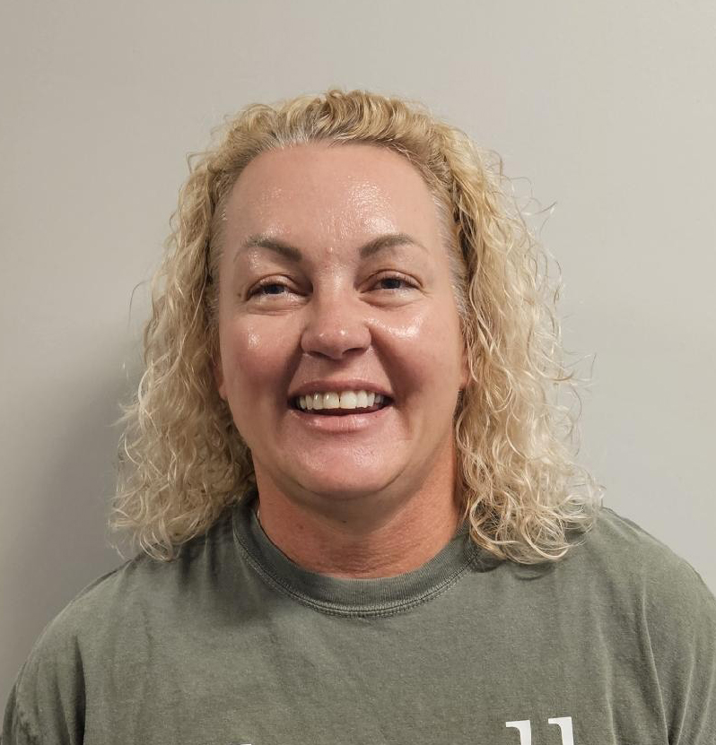 Mrs McMahon smiling for the camera